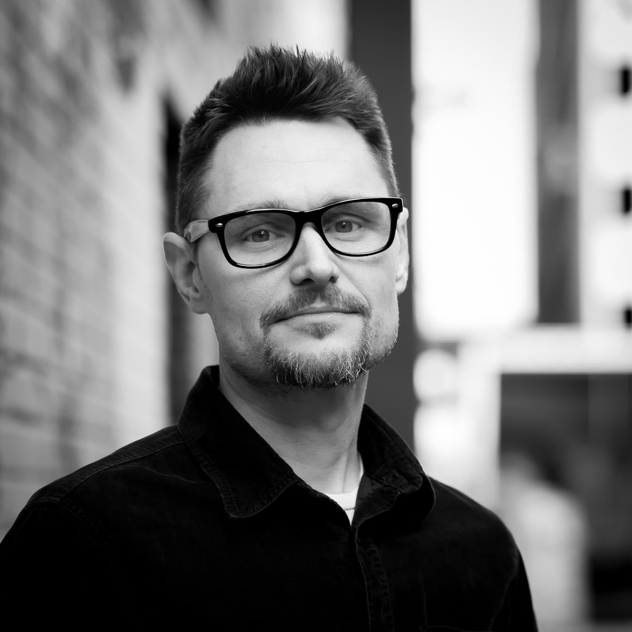Portrait of Christopher Driscoll, Ph.D., owner and editor-in-chief of ExactRush